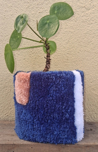 Cache-pot tufté en laine acrylique allie simplicité et élégance pour embellir ton intérieur